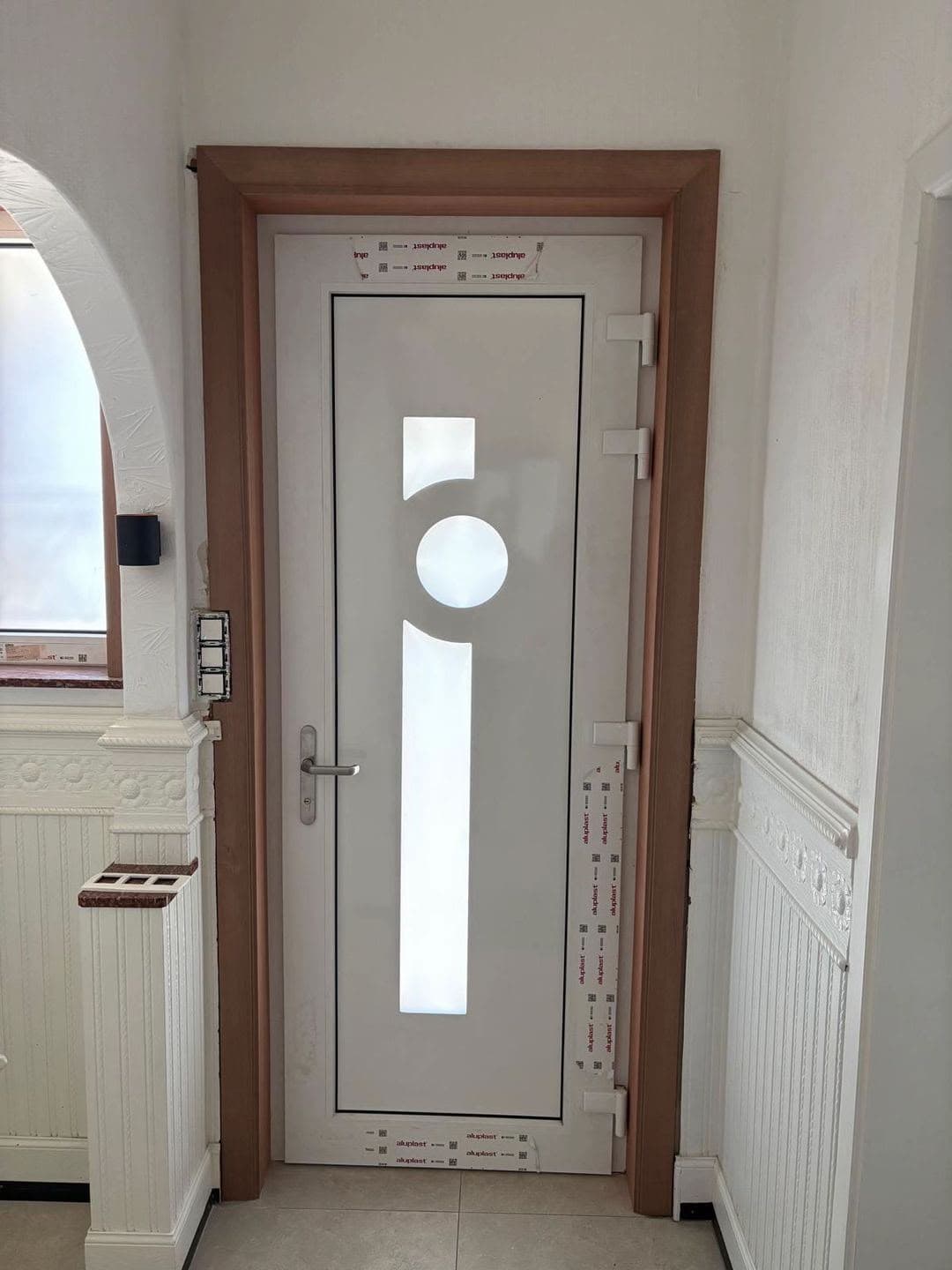 Porte blanche avec vitrage décoratif